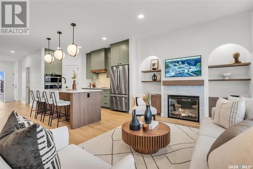 4 720 Brighton Boulevard, Saskatoon, SK - Indoor Photo Showing Living Room With Fireplace