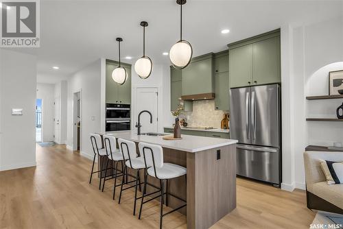 4 720 Brighton Boulevard, Saskatoon, SK - Indoor Photo Showing Kitchen With Upgraded Kitchen