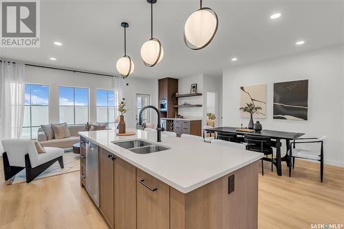 4 720 Brighton Boulevard, Saskatoon, SK - Indoor Photo Showing Kitchen With Double Sink