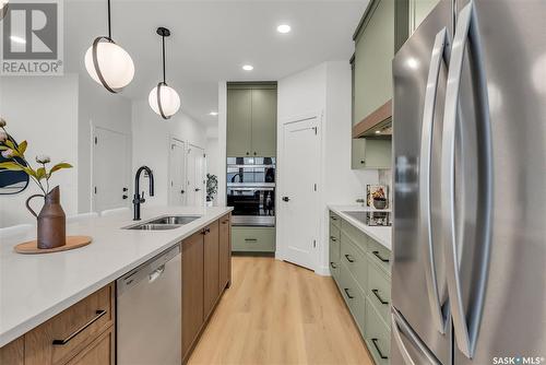 4 720 Brighton Boulevard, Saskatoon, SK - Indoor Photo Showing Kitchen With Double Sink With Upgraded Kitchen