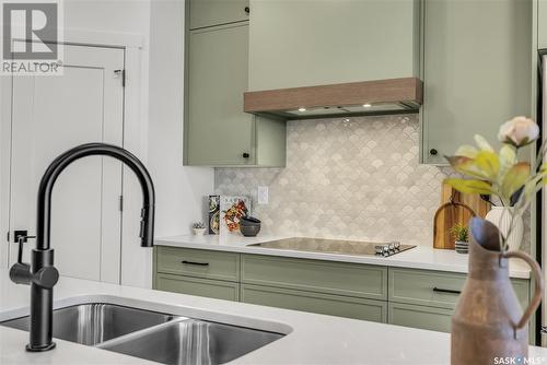 6 720 Brighton Boulevard, Saskatoon, SK - Indoor Photo Showing Kitchen With Double Sink