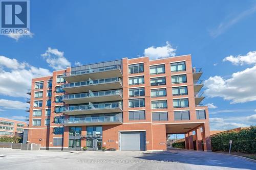 438 - 7608 Yonge Street, Vaughan, ON - Outdoor With Balcony With Facade