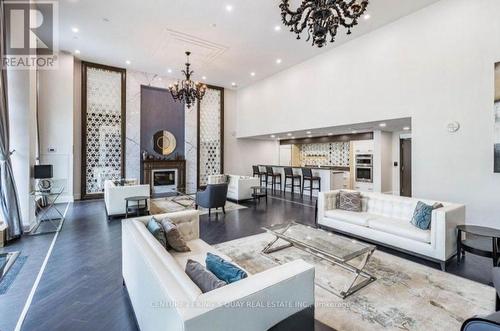 438 - 7608 Yonge Street, Vaughan, ON - Indoor Photo Showing Living Room With Fireplace