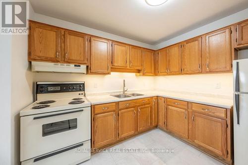 104 - 920 Ford Street, Peterborough (Otonabee), ON - Indoor Photo Showing Kitchen With Double Sink