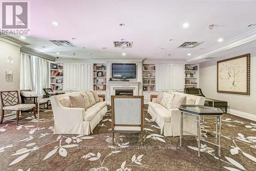 408 - 15 Rean Drive, Toronto, ON - Indoor Photo Showing Other Room With Fireplace