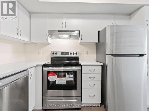 442 - 2789 Eglinton Avenue E, Toronto, ON - Indoor Photo Showing Kitchen With Stainless Steel Kitchen