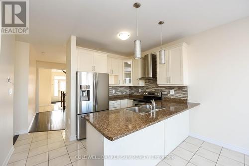 124 Tysonville Circle, Brampton, ON - Indoor Photo Showing Kitchen With Double Sink