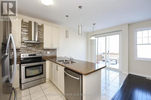 124 Tysonville Circle, Brampton, ON - Indoor Photo Showing Kitchen With Double Sink