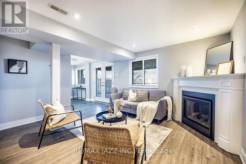 32 Parkins Drive, Ajax (Central), ON - Indoor Photo Showing Living Room With Fireplace