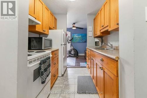 201 - 925 10Th Avenue E, Owen Sound, ON - Indoor Photo Showing Kitchen