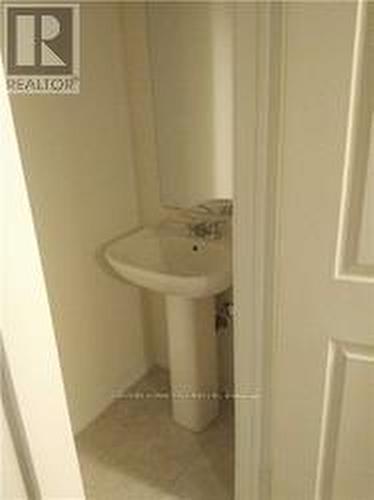 115 - 100 Parrotta Drive, Toronto, ON - Indoor Photo Showing Bathroom