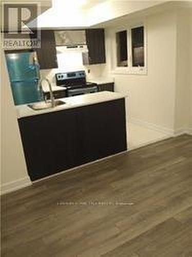 115 - 100 Parrotta Drive, Toronto, ON - Indoor Photo Showing Kitchen