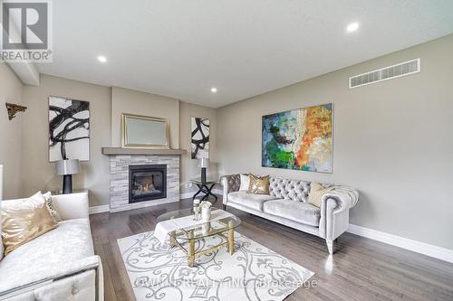 538 Masters Drive, Woodstock, ON - Indoor Photo Showing Living Room With Fireplace