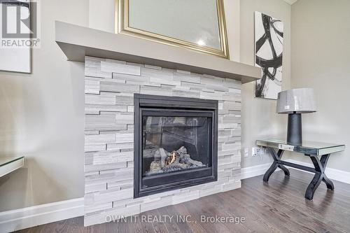 538 Masters Drive, Woodstock, ON - Indoor Photo Showing Other Room With Fireplace