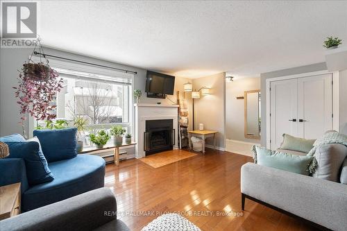 85A - 758 St. Andre Drive, Ottawa, ON - Indoor Photo Showing Living Room With Fireplace