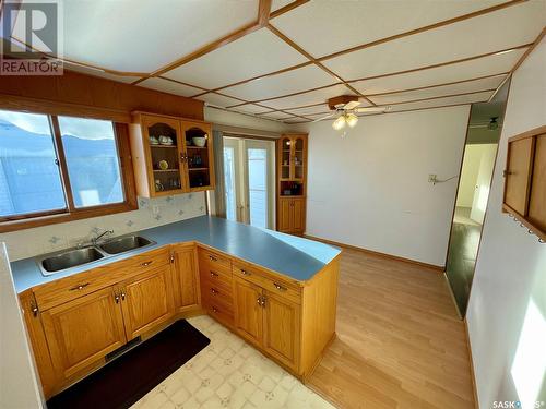 715 6Th Avenue, Hudson Bay, SK - Indoor Photo Showing Kitchen With Double Sink