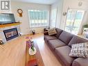 16-4897 Ontario Ave, Powell River, BC  - Indoor Photo Showing Living Room With Fireplace 