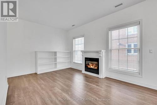 106 Robert'S Row, Cobourg, ON - Indoor Photo Showing Living Room With Fireplace