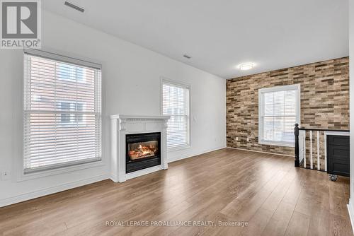 106 Robert'S Row, Cobourg, ON - Indoor Photo Showing Living Room With Fireplace