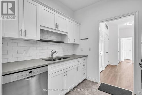 106 Robert'S Row, Cobourg, ON - Indoor Photo Showing Kitchen With Double Sink