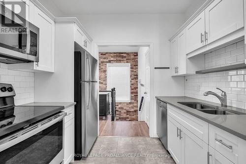 106 Robert'S Row, Cobourg, ON - Indoor Photo Showing Kitchen With Stainless Steel Kitchen With Double Sink