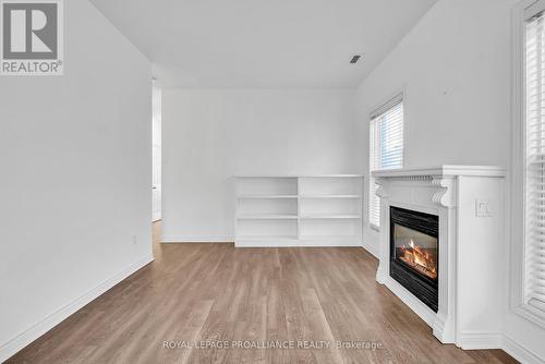 106 Robert'S Row, Cobourg, ON - Indoor With Fireplace