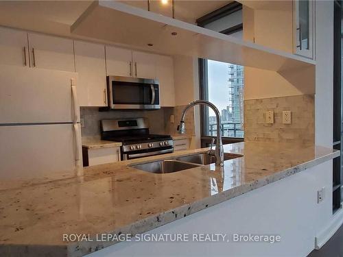 1103-3 Navy Wharf Crt, Toronto, ON - Indoor Photo Showing Kitchen With Double Sink