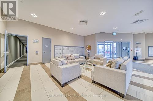 205 - 2150 Lawrence Avenue E, Toronto, ON - Indoor Photo Showing Living Room