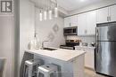 103 - 84 Aspen Springs Drive, Clarington, ON  - Indoor Photo Showing Kitchen With Stainless Steel Kitchen With Double Sink 