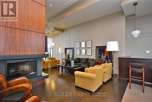 709 - 388 Prince Of Wales Drive, Mississauga, ON - Indoor Photo Showing Living Room With Fireplace