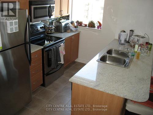 709 - 388 Prince Of Wales Drive, Mississauga, ON - Indoor Photo Showing Kitchen With Double Sink