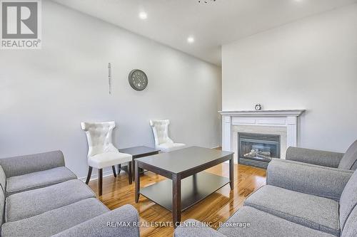 3398 Crimson King Circle, Mississauga, ON - Indoor Photo Showing Living Room With Fireplace