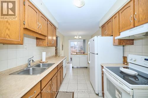 4 - 23 Dynasty Avenue, Hamilton (Stoney Creek), ON - Indoor Photo Showing Kitchen With Double Sink