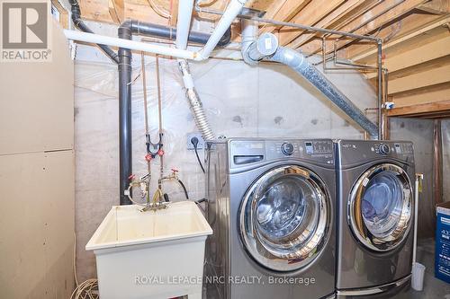 4 - 23 Dynasty Avenue, Hamilton (Stoney Creek), ON - Indoor Photo Showing Laundry Room