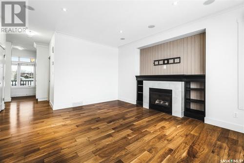 8075 Wascana Gardens Crescent, Regina, SK - Indoor Photo Showing Other Room With Fireplace