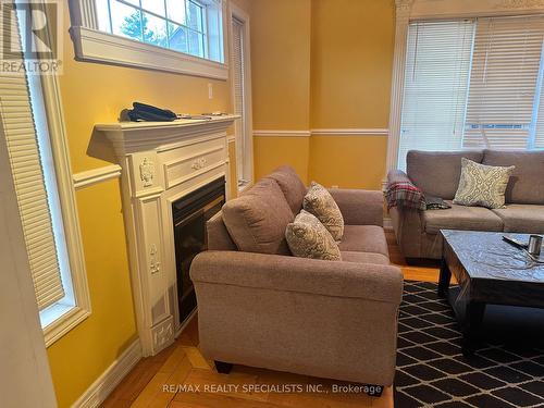 Main2Nd - 960 Knotty Pine Grove, Mississauga, ON - Indoor Photo Showing Living Room With Fireplace