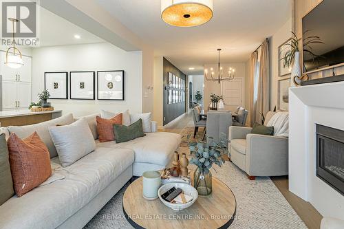 6865 Royal Magnolia Avenue, London, ON - Indoor Photo Showing Living Room With Fireplace