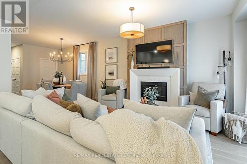 6865 Royal Magnolia Avenue, London, ON - Indoor Photo Showing Living Room With Fireplace