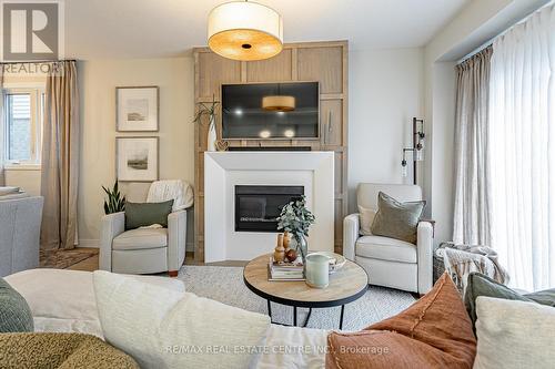 6865 Royal Magnolia Avenue, London, ON - Indoor Photo Showing Living Room With Fireplace