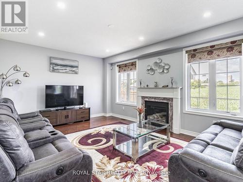 24 Bonnieglen Farm Boulevard, Caledon, ON - Indoor Photo Showing Living Room With Fireplace