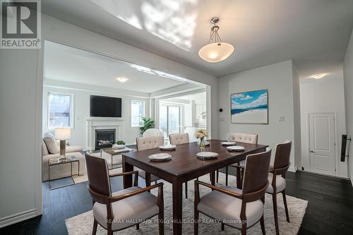 713 Mika Street, Innisfil, ON - Indoor Photo Showing Dining Room With Fireplace