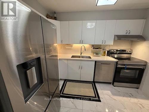 901 - 360 Ridelle Avenue, Toronto, ON - Indoor Photo Showing Kitchen With Double Sink