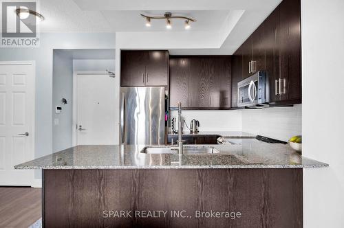 1018 - 15 James Finlay Way, Toronto, ON - Indoor Photo Showing Kitchen With Upgraded Kitchen