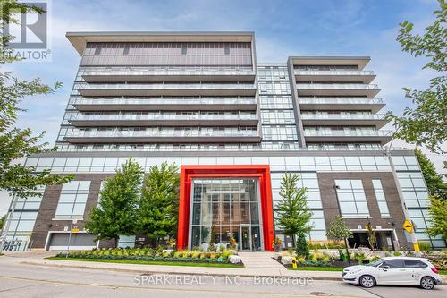 1018 - 15 James Finlay Way, Toronto, ON - Outdoor With Balcony With Facade