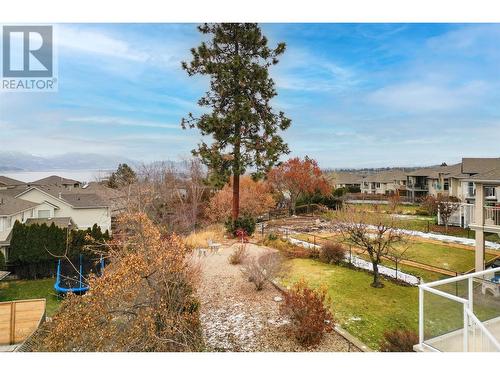 Landscaped backyard - 620 Arrowleaf Lane, Kelowna, BC - Outdoor With View