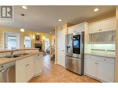 Refrigerator (2020) - 620 Arrowleaf Lane, Kelowna, BC - Indoor Photo Showing Kitchen With Double Sink