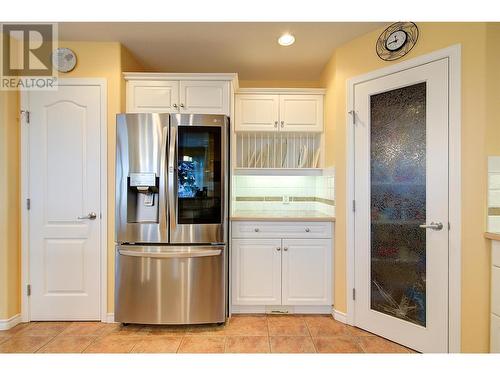 Corner pantry with lots of storage! - 620 Arrowleaf Lane, Kelowna, BC - Indoor