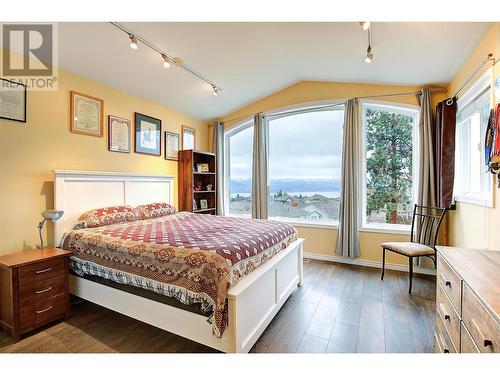 Bedroom #2 with lake view! - 620 Arrowleaf Lane, Kelowna, BC - Indoor Photo Showing Bedroom