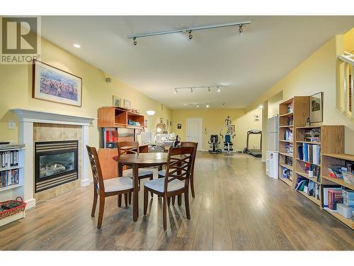 Rec room area with gas fireplace - 620 Arrowleaf Lane, Kelowna, BC - Indoor With Fireplace