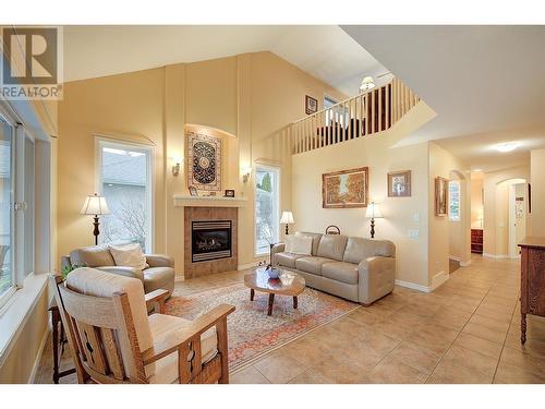 Living Area - 620 Arrowleaf Lane, Kelowna, BC - Indoor Photo Showing Living Room With Fireplace